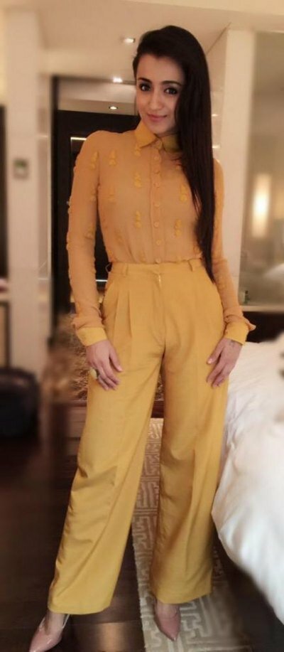 Trisha Krishnan and Kamal Haasan unveil trailer for Thoongavanam and Cheekati Rajyam Trisha Krishnan looked chic and business-like in a mustard-yellow Poco & Jacky outfit